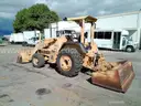 2002 JOHN DEERE 210LE