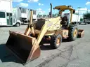 2002 JOHN DEERE 210LE