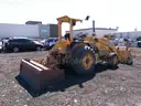 2002 JOHN DEERE 210LE