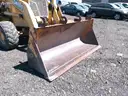 2002 JOHN DEERE 210LE