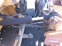 2002 JOHN DEERE 210LE