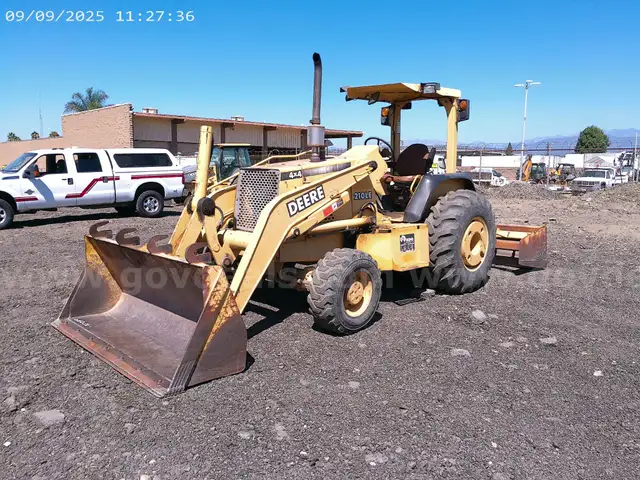 2002 JOHN DEERE 210LE