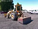 2002 JOHN DEERE 210LE