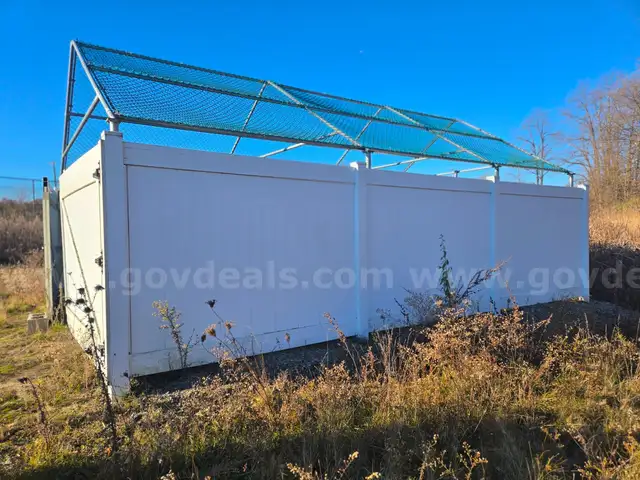 Approximately 16ft x 24ft steel framing, with roof or top like frame.