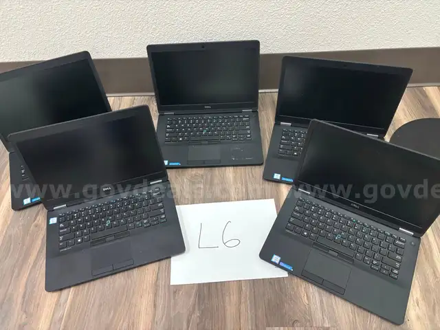 L-6 Five DELL Laptops