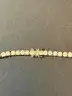 22in Tennis Neckless, stamped 14K GF (gold-filled). NOT GOLD.