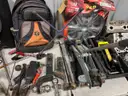 Assorted tools and engine parts