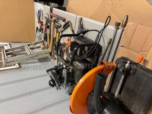 Saw, compressor, hammers and ladder