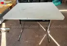 Small metal desk with white top