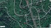 Prime Half-Acre Build Lot in Saw Creek Estates &#x2014; Woods, Privacy &#x26; Resort Amenities
