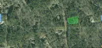Attention Investors: Infill Lot Surrounded by Built Homes in Hot Springs Village &#x2013; Discounted &#x26; Ready to Build