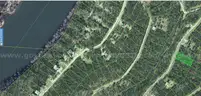 Holiday Island Lot on Danube Dr &#x2013; 0.37 Acre Wooded Homesite Minutes to Marina &#x26; Lake &#x2013; $20K Value