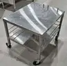 LOT of Two (2) Stainless Steel tables on wheels