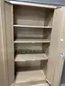 Tan storage cabinet