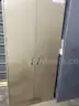 Tan storage cabinet
