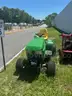 Lockers, 3 each Metal Desks, 7 Cabinets, 1 John Deer Tractor (small) Old Tractor attachments