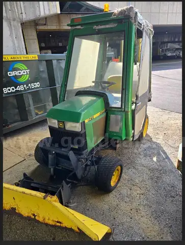 John Deere 425 Tractor with Plow