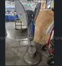 SOUTHWORTH PALLET TILTERS (2 units) AND FLOOR SCRUBBER (1 unit0