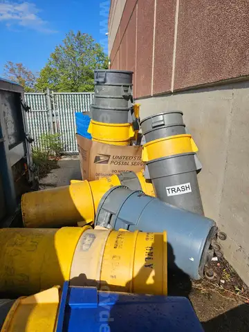 Lot of approximately 30, 55-gallon trash cans.