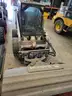 Bobcat 753 Skid Steer Loader with broom, scoop, and brush cat attachments