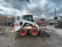Bobcat Skid Steer + 2 Buckets
