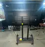 Aver 65 inch Interactive Flat Panel Board on a wheeled stand. Android OS. Factory reset and in good condition.