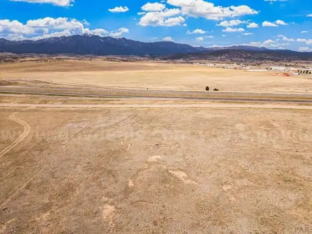 Grand Buildable Colorado City Lot with 4-Season Climate and Easy Access