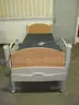 NILL-ROM MEDICAL BED W/MATTRESS