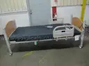NILL-ROM MEDICAL BED W/MATTRESS