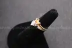 Gold Colored Ring with Multiple Clear Stones
