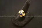 Gold colored ring with  multiple colored stones and multiple clear stones