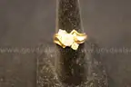 Gold colored ring with multiple clear stones