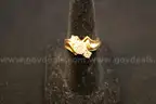 Gold colored ring with multiple clear stones
