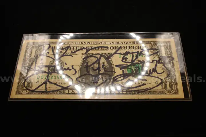 1- series 2003 one dollar bill signed by several people, including &#x22;rvz&#x22;, &#x22;artimus&#x22;, (possibly from Lynyrd Skynyrd)