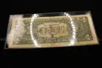 1- series 2003 one dollar bill signed by several people, including &#x22;rvz&#x22;, &#x22;artimus&#x22;, (possibly from Lynyrd Skynyrd)
