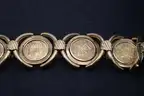 Bracelet containing 5 coins