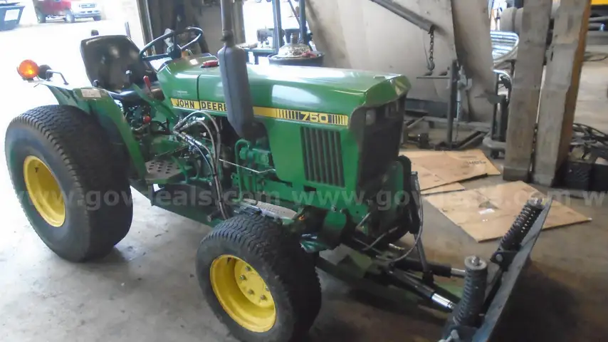 John Deere 750 Tractor with 60 in. Hydraulic Dozer Blade