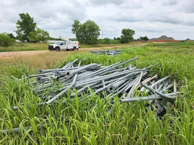 Lot of Traffic Signal Poles and Roadway Lighting Poles