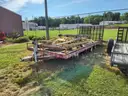 Olathe Red Tilt Gate Trailer