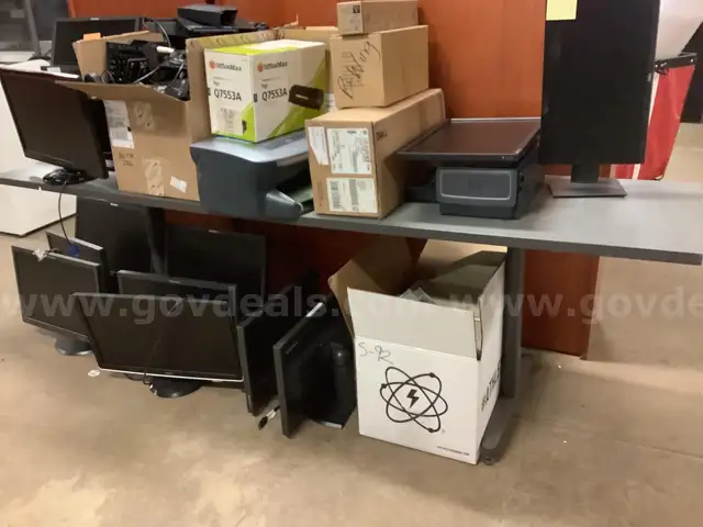 Lot of monitors, keyboards, miscellaneous