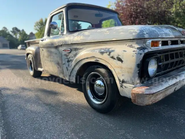 1965 Ford F100.  Restored.  302 v8, automatic, 4 wheel disc brakes