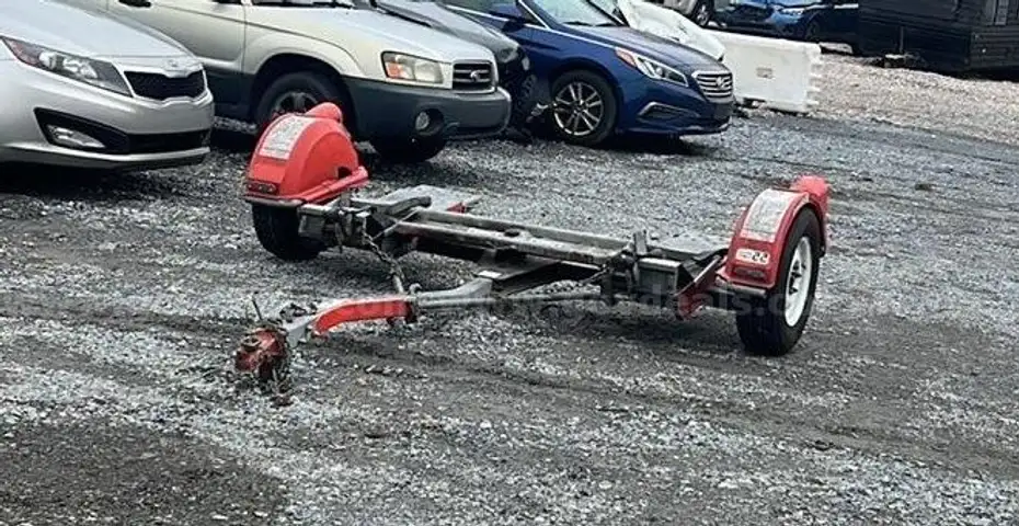 Tow behind car dolly