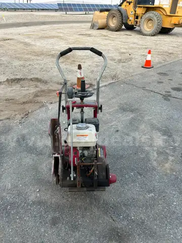 Used MK walk behind saw