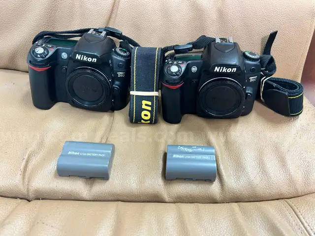 FREE SHIPPING - Nikon DSLR Bodies W Batteries Unknown Condition