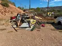 Scrap metal, barrels, old road signs