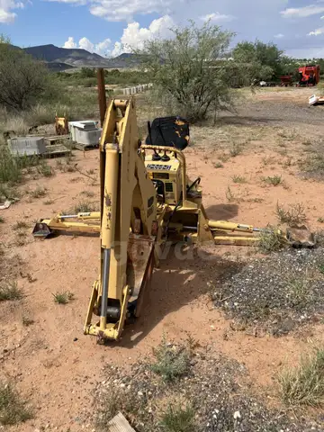 Backhoe attachment