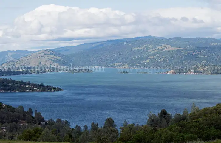 Paved Rd Frontage, Water, Power Treed Sloped View Lot .37 Ac Clear Lake California Area