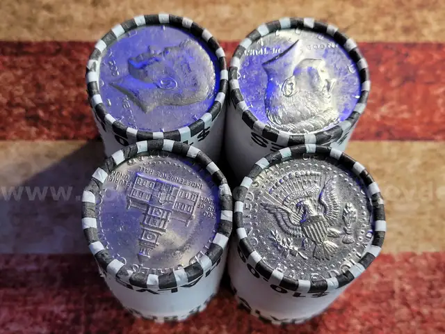 4 Rolls of Kennedy Half Dollars Unopened