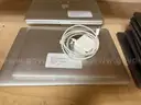 11 - Apple MacBook Laptops with some power adapters