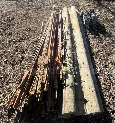 Lot of Posts and Barbed Wire